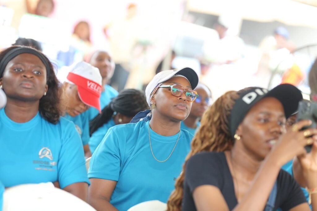 Players and supporters cheering courtside at the Lagos Ladies Open
