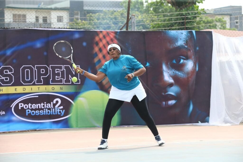 A player returns a serve during the fourth edition